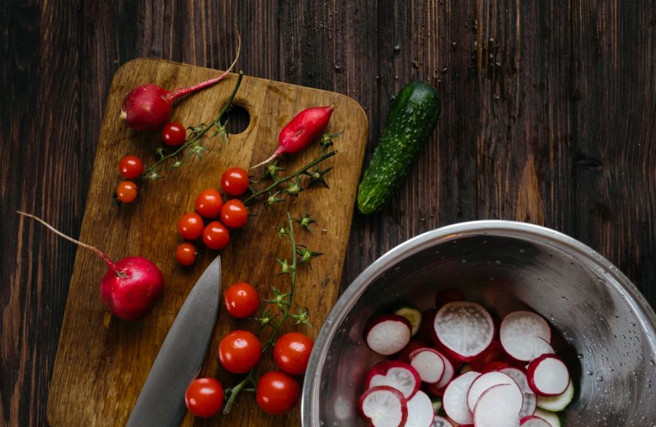 Fresh seasonal vegetables prepared for a simple summer salad.